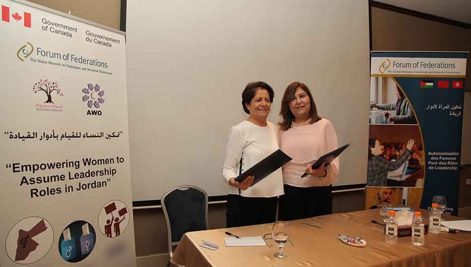 Leila Naffa and Sawson Tawil posing for photo after signing MOU
