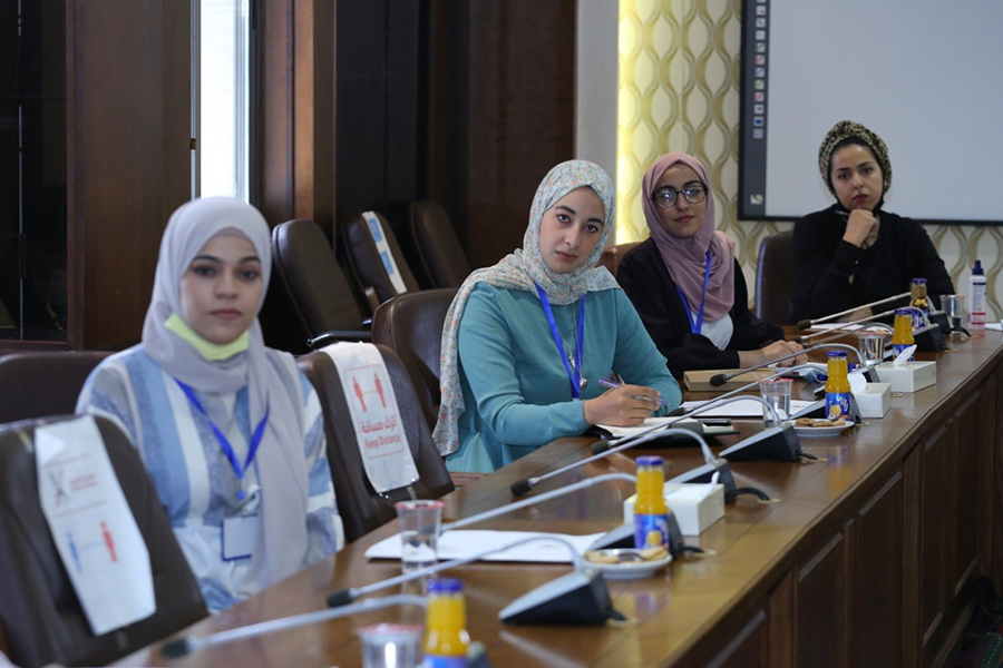 Four women at panel discussion in MENA region